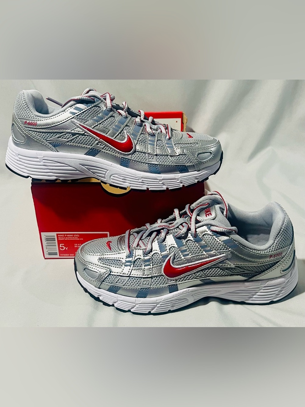 Nike Youth Silver Running Sneakers with Red Swoosh